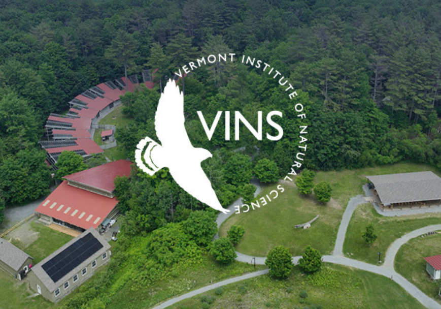 VINS logo in front of an aerial view of the Nature Center